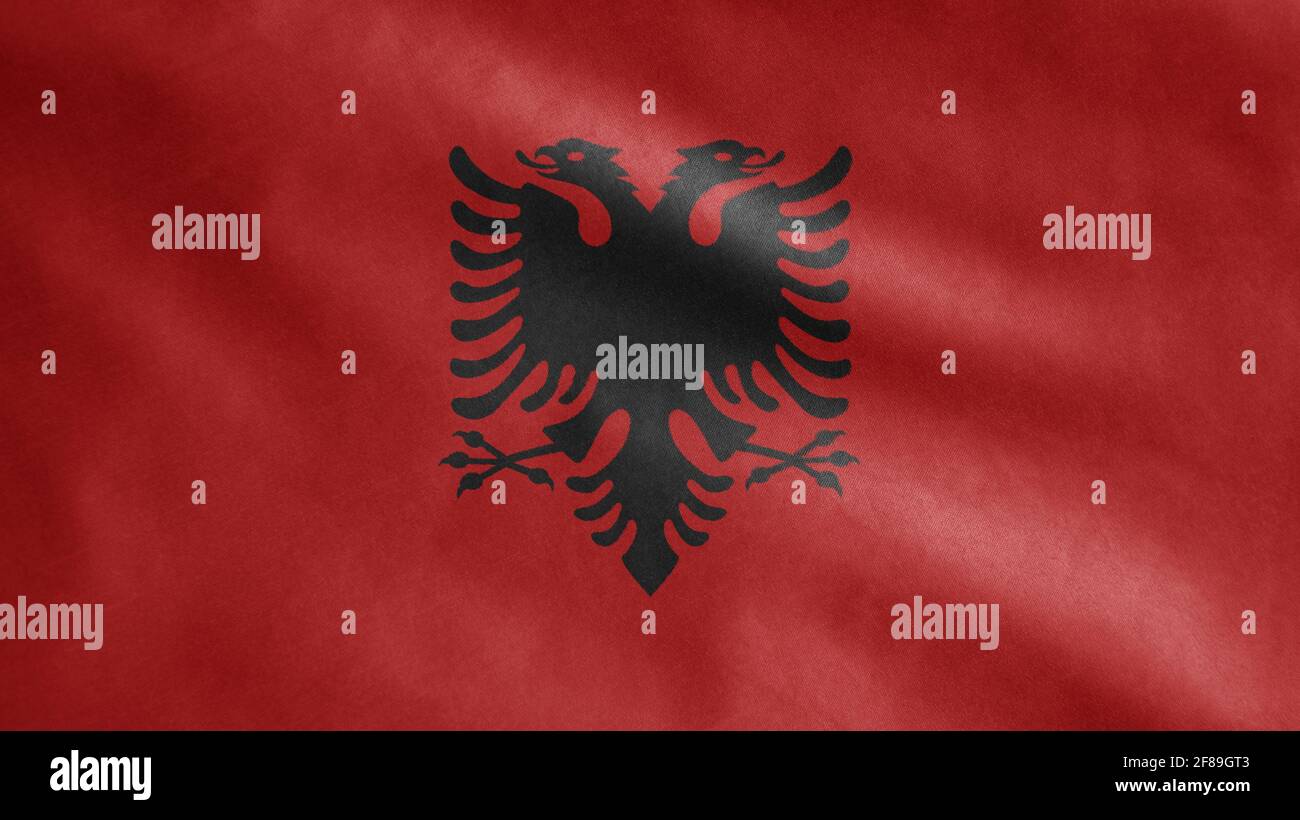 Albanian flag waving in the wind. Close up of Albania banner blowing ...
