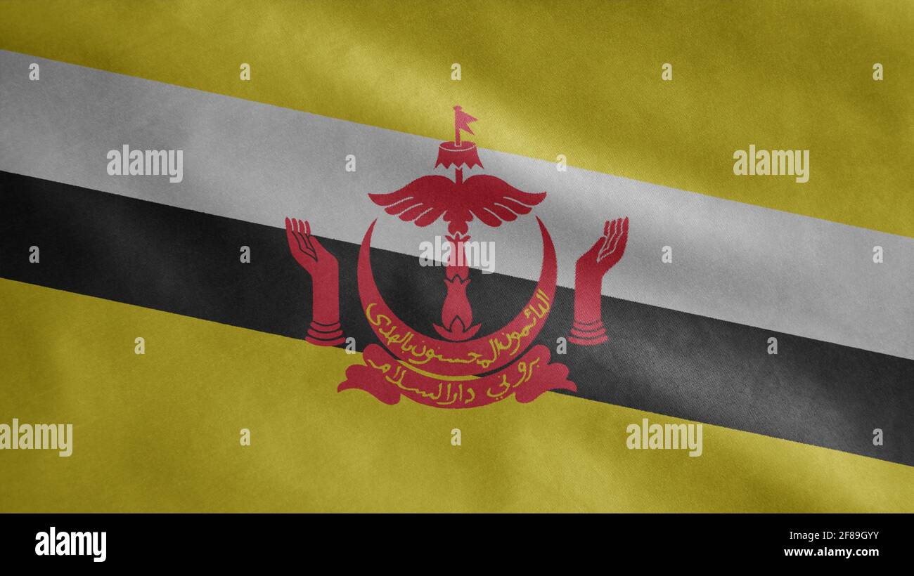 Bruneian flag waving in the wind. Close up of Brunei banner blowing, soft and smooth silk. Cloth fabric texture ensign background. Stock Photo