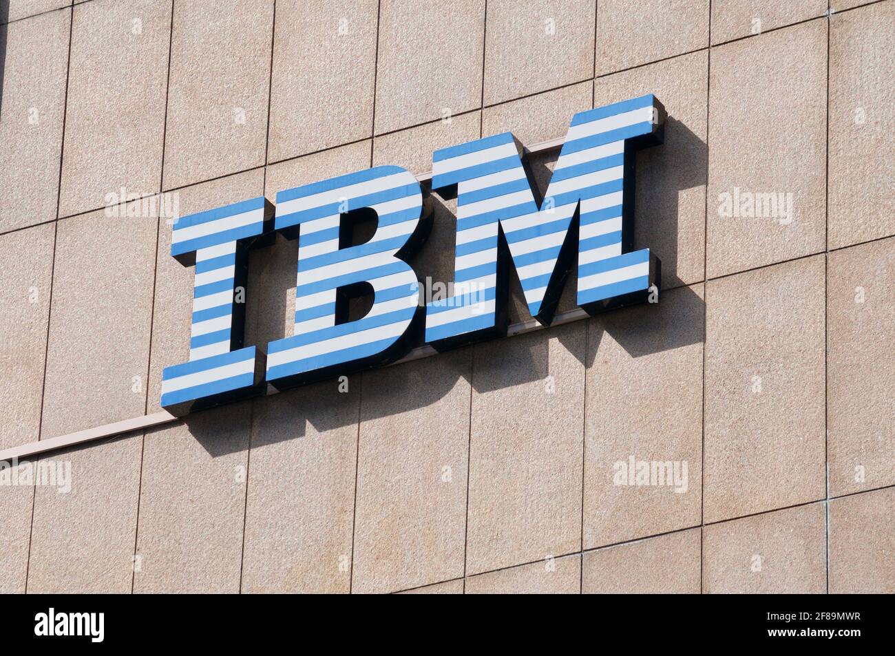 Lugano, Ticino, Switzerland - 1st April 2021 : IBM (International Business Machines Corporation) sign hanging on a building in Lugano. IBM is an Ameri Stock Photo