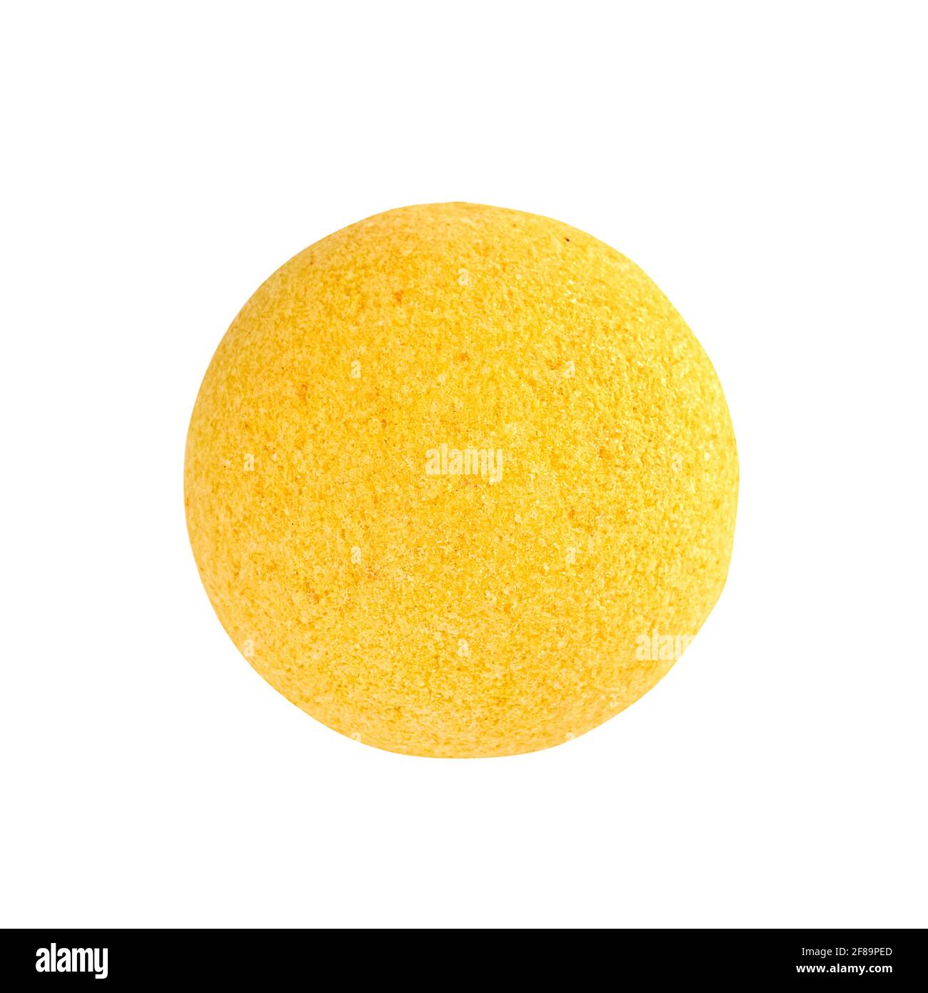 Yellow bath bomb, isolated over white background with clipping path Stock Photo