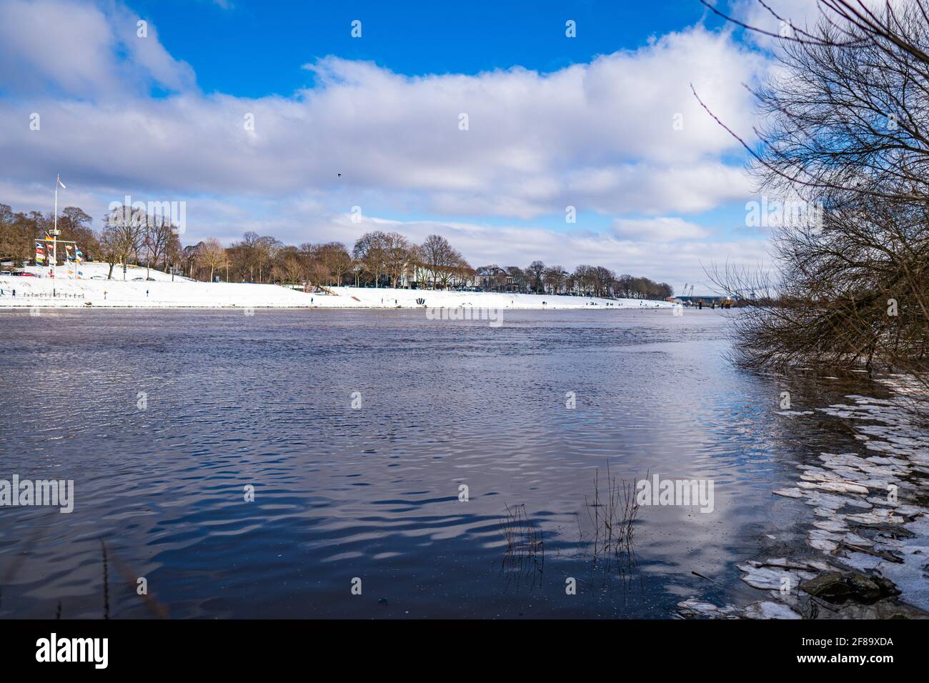 view over weser and snowy osterdeich in winter in bremen Stock Photo