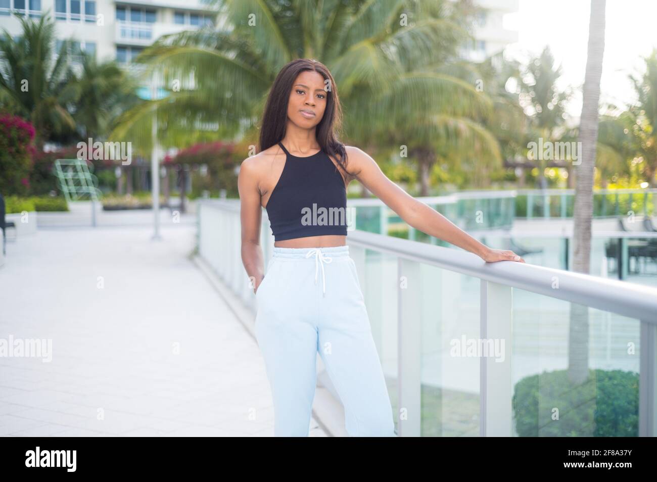 Portrait of a Young African American Woman Casually standing outside Stock Photo