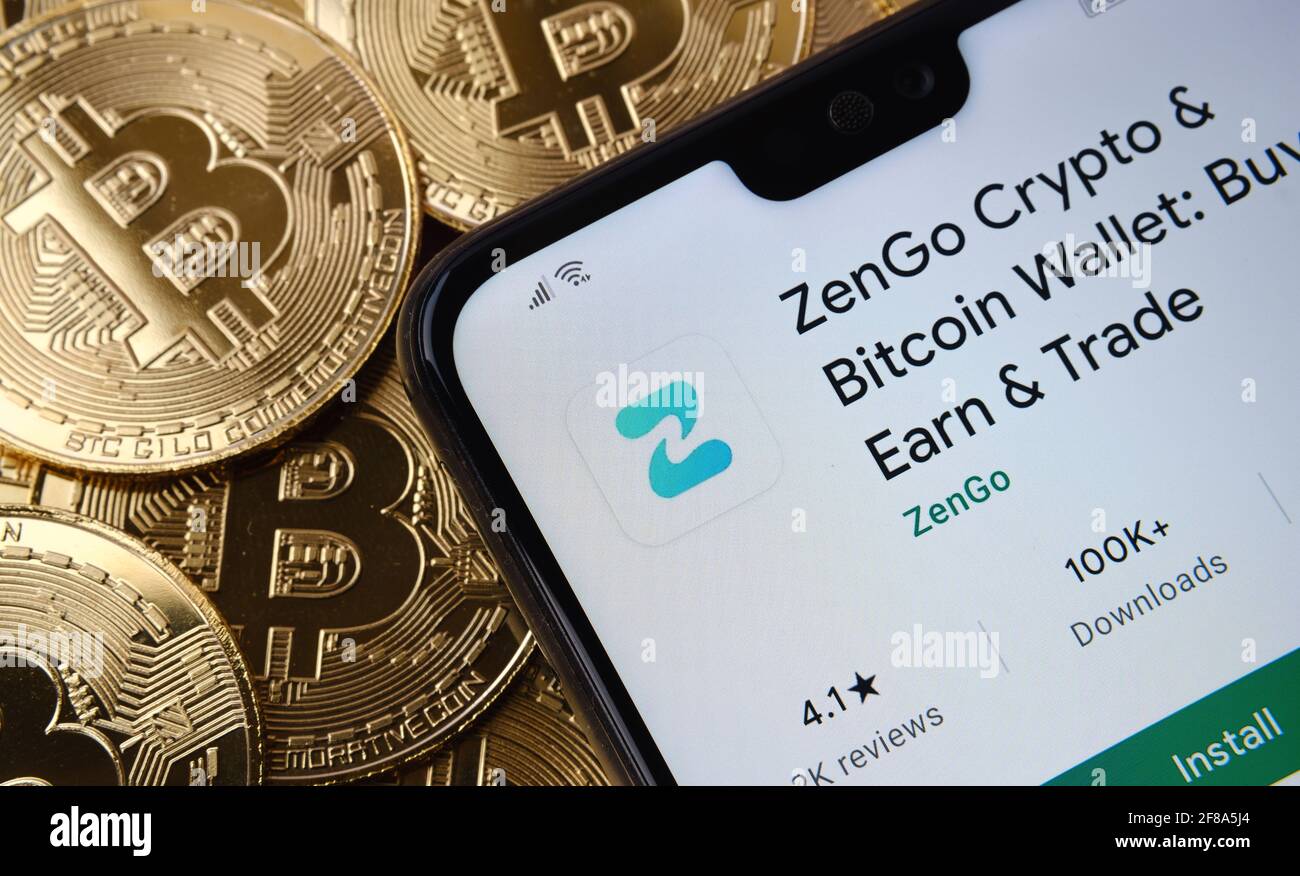 ZenGo Crypto app seen on the smartphone screen placed on top bitcoin coins  pile. Concept. Stafford, United Kingdom, April 12, 2021 Stock Photo - Alamy