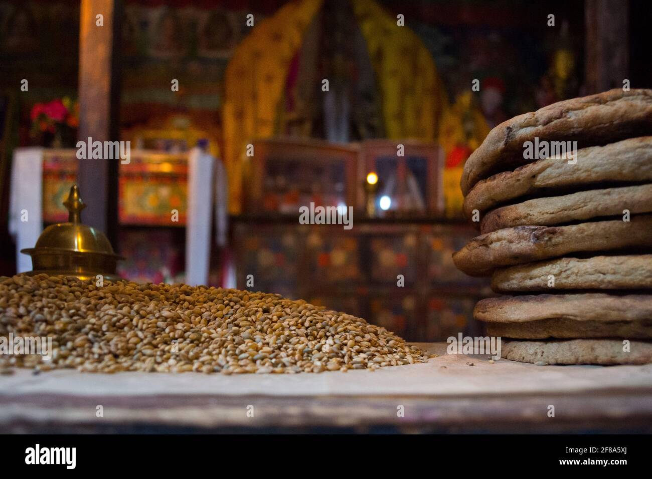 Zanskar, India. Grains and bread inside Tibetan Buddhist monastery Stock Photo