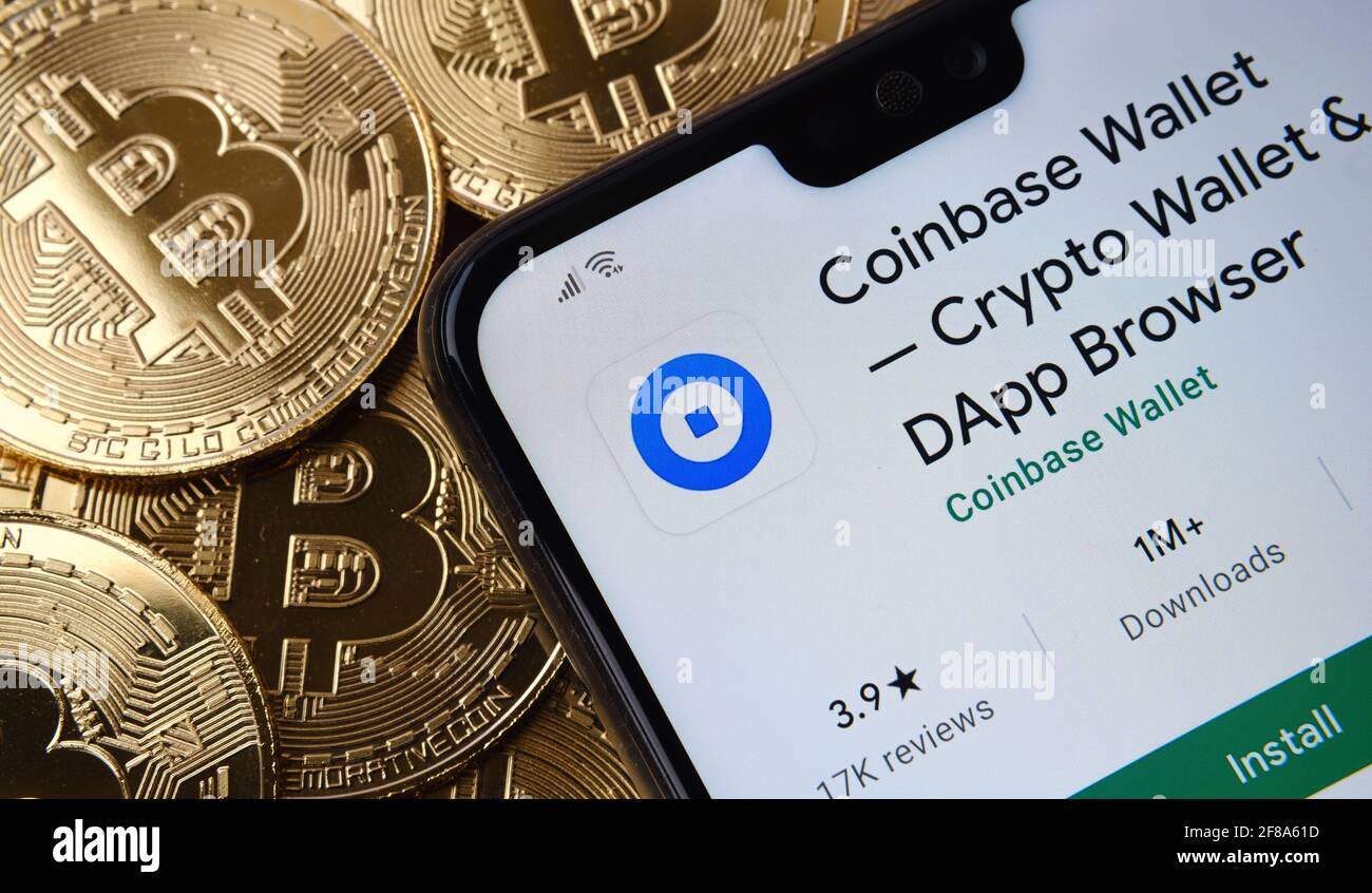 Coinbase Wallet app seen on the smartphone screen placed on top bitcoin  coins pile. Concept. Stafford, United Kingdom, April 12, 2021 Stock Photo -  Alamy