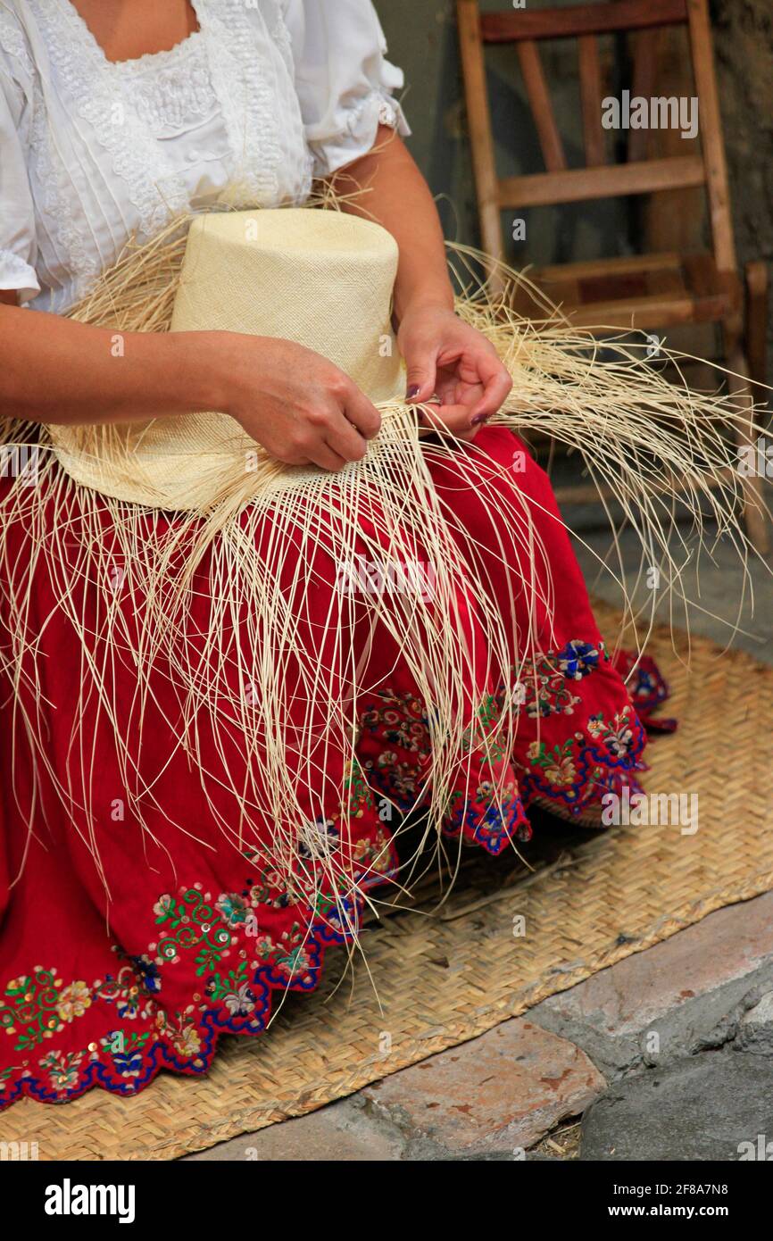 Woman's Hands Weaving a Straw Panama Hat in Cuenca, Ecuador, South America Stock Photo