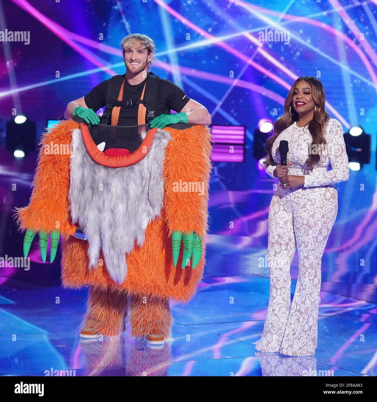 THE MASKED SINGER, from left Logan Paul (revealed as Grandpa Monster