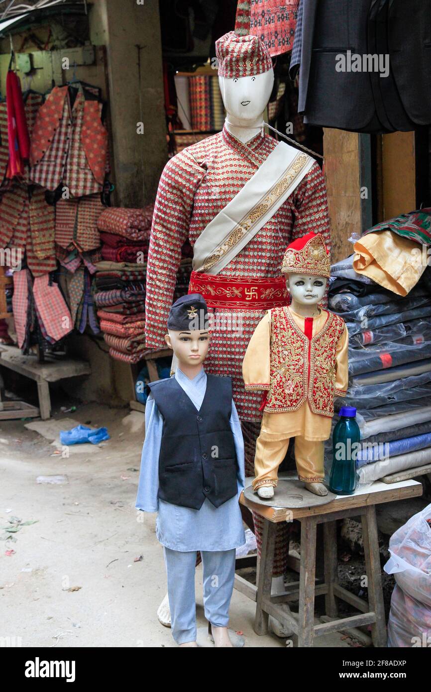 Mannequins wearing traditional Nepalese dress in marketplace in Kathmandu, Nepal Stock Photo