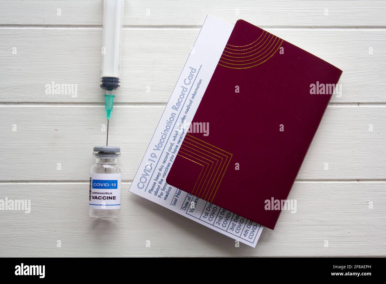 Passport, COVID-19 Vaccination record card and COVID-19 vaccine ...