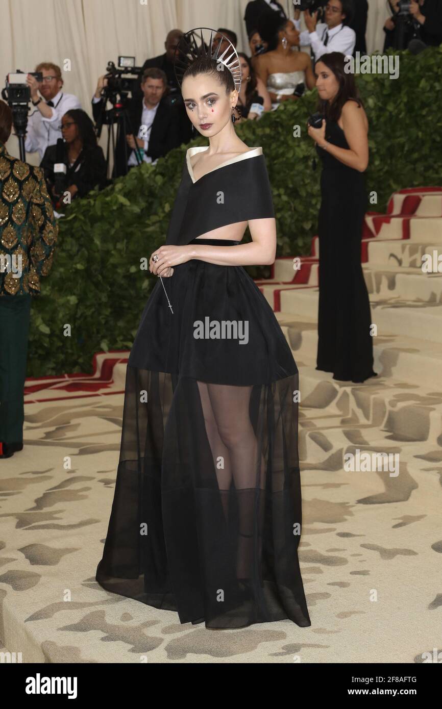 Lily Collins during the 2018 Met Costume Gala Heavenly Bodies, held at the Metropolitan Museum of Art in New York City, Monday, May 7, 2018. Photo by Jennifer Graylock-Graylock.com 917-519-7666 Stock Photo