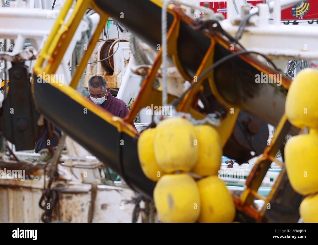 Fukushima Japan April 13 21 A Fisherman Engages In Maintenance Work On A Fishing Boat At A Port In Soma In Fukushima Prefecture Northeastern Japan On April 13 21 The Japanese Government