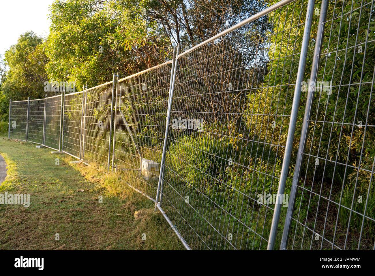 Temporary fencing installed prior to work being carried out Stock Photo