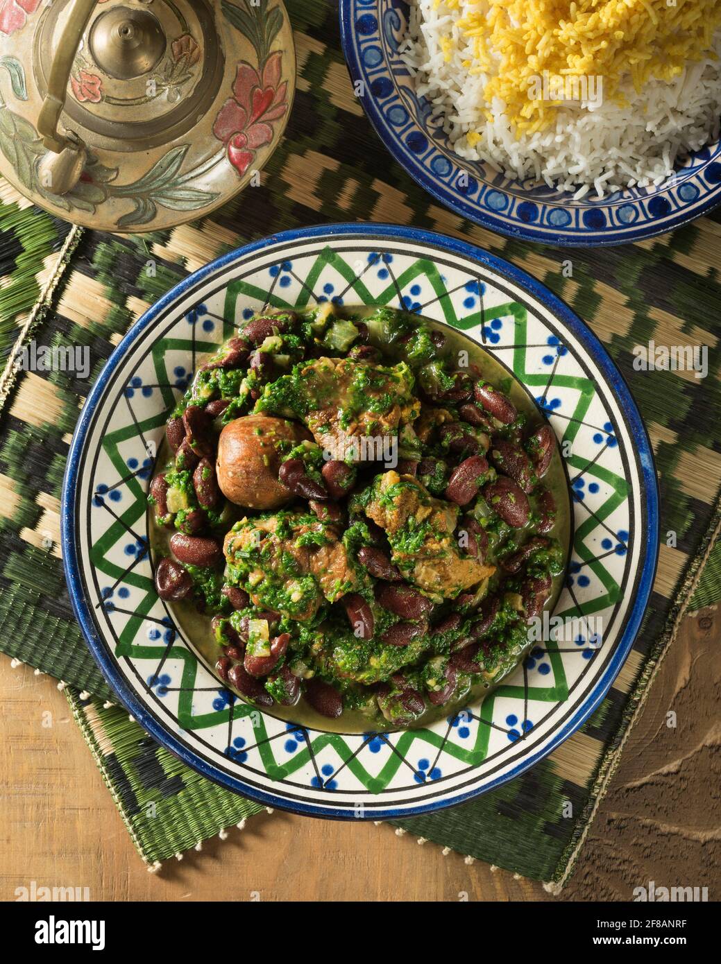 Khoresh ghormeh sabzi. Iranian lamb and herb stew. Iran Food Stock Photo