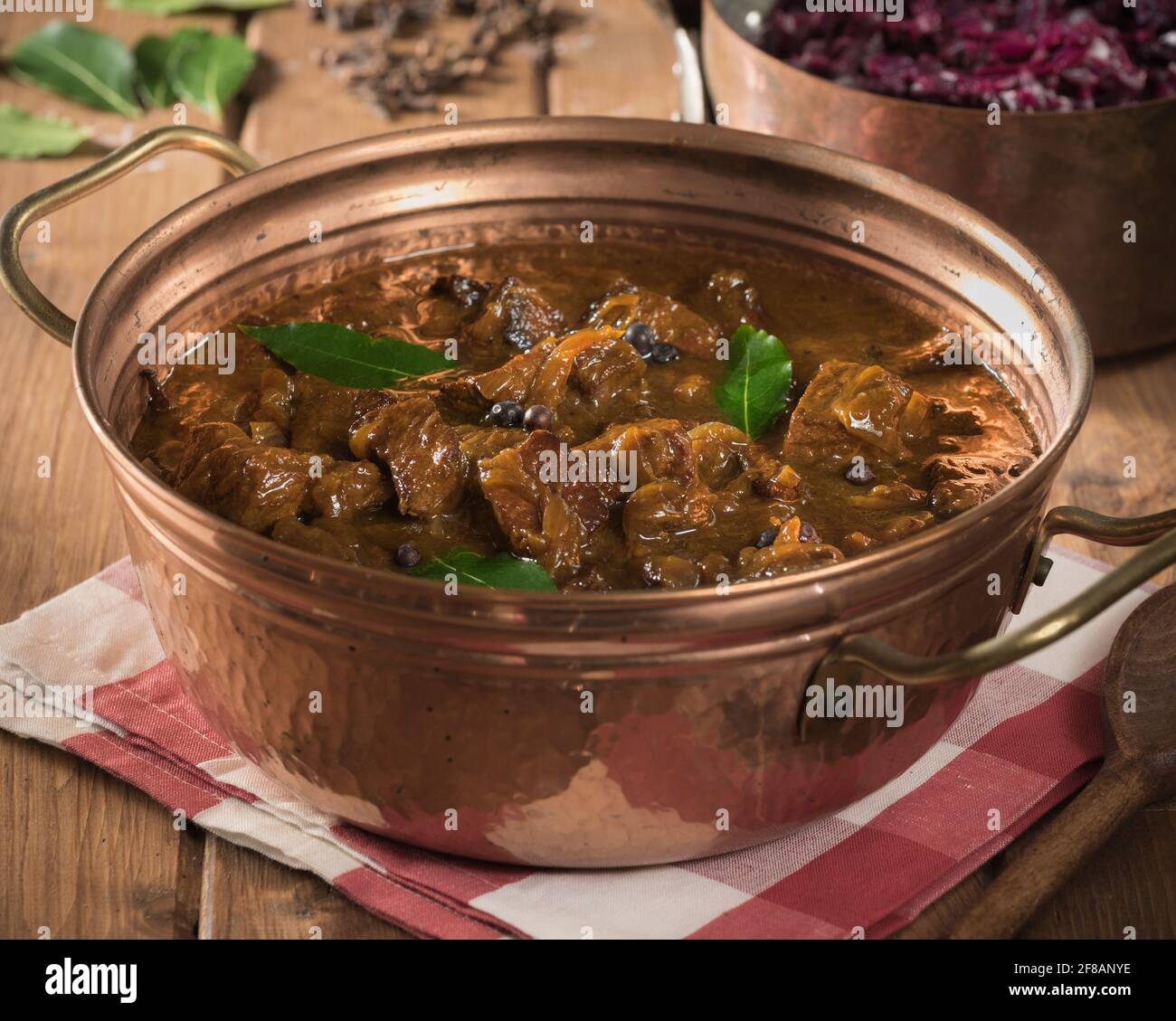 Hachee. Dutch beef and onion stew with red cabbage. Netherlands Food Stock Photo