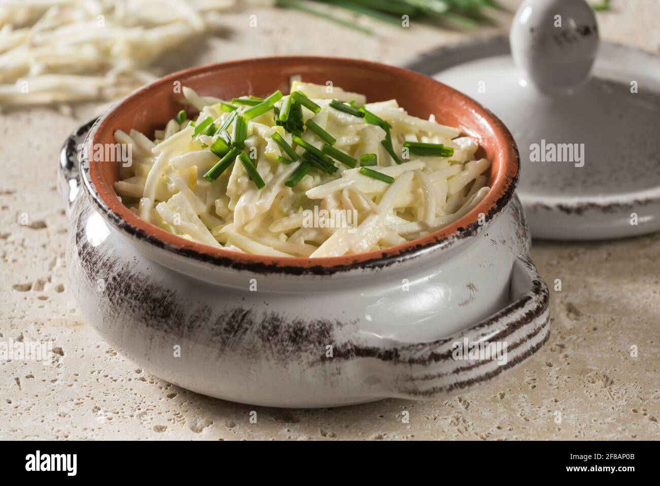 Celeriac remoulade. Celery root salad in mustard mayonnaise. Stock Photo