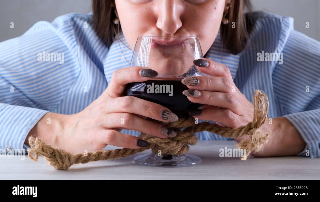 Drinker Rope female funny drinks from a wine glass tied with a jute rope. The ...
