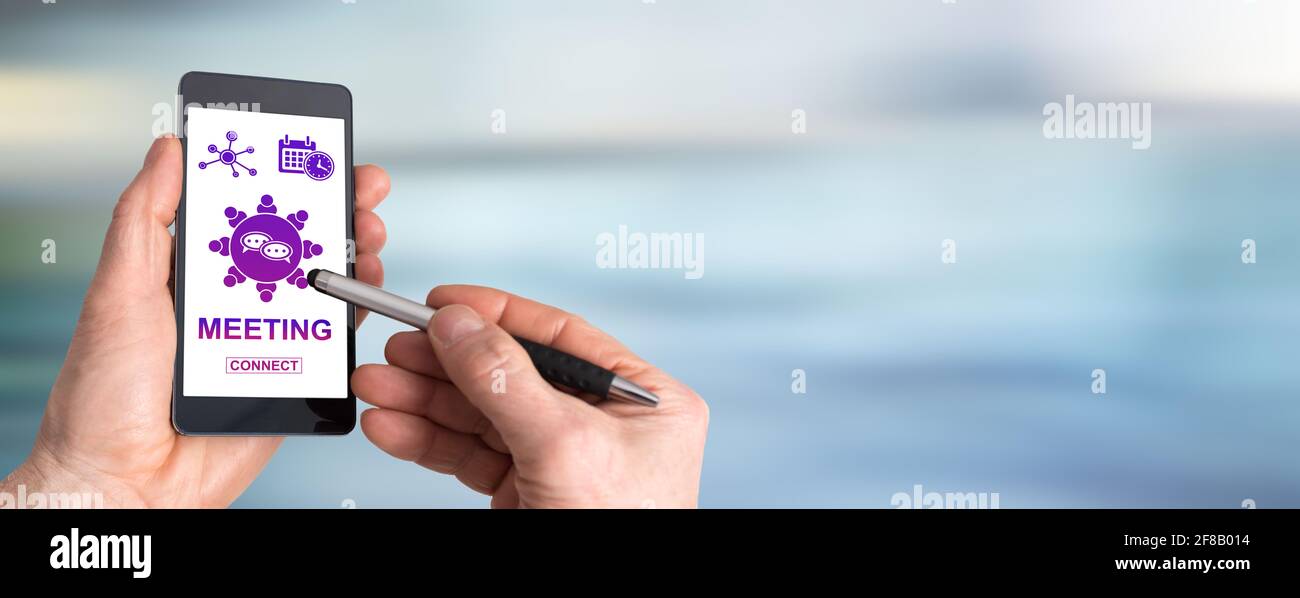 Smartphone screen displaying a meeting concept Stock Photo - Alamy