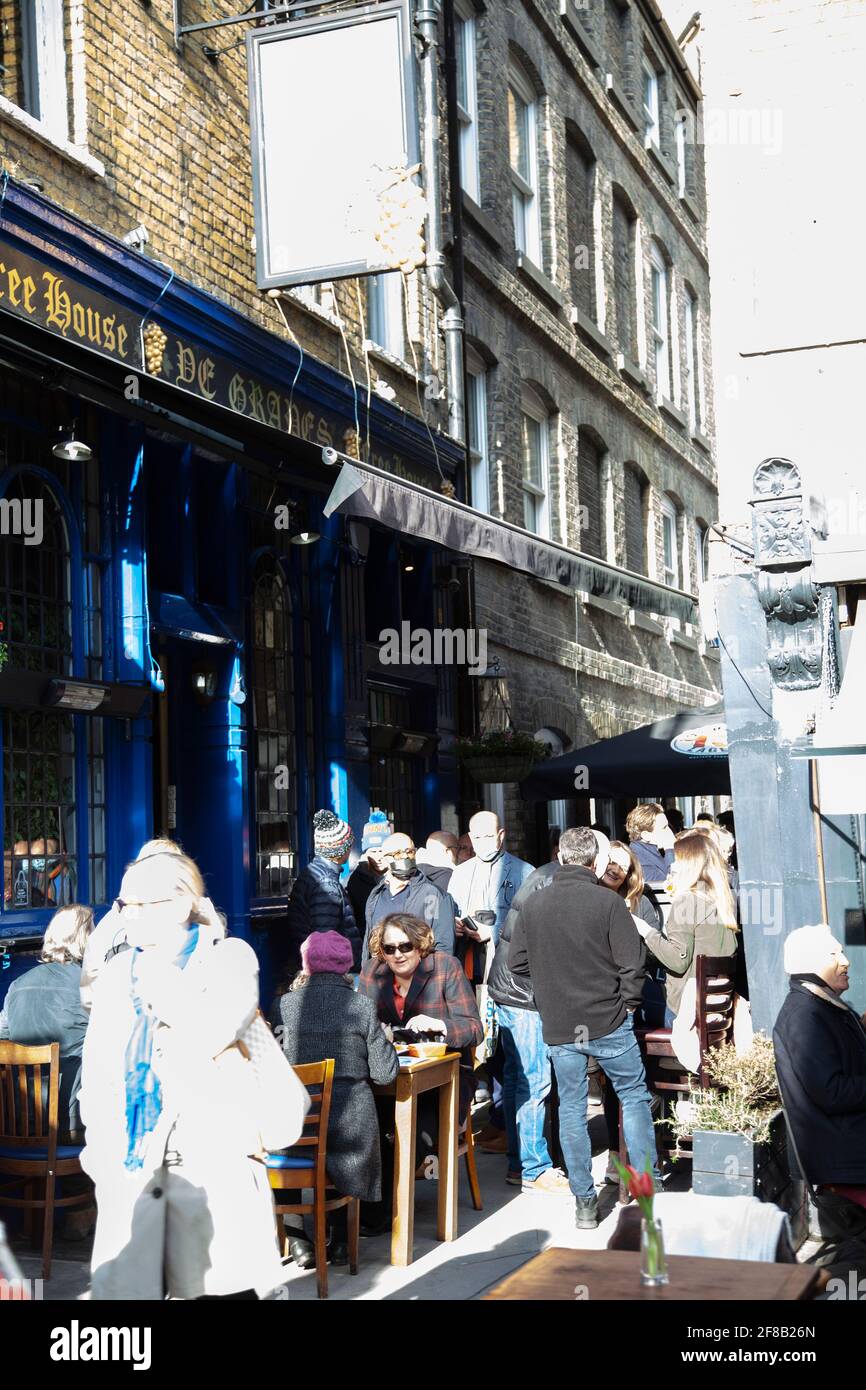 First Day after Lockdown, 12 April 2021, People Drinking at Ye Grapes Free House, W1 - London UK Stock Photo