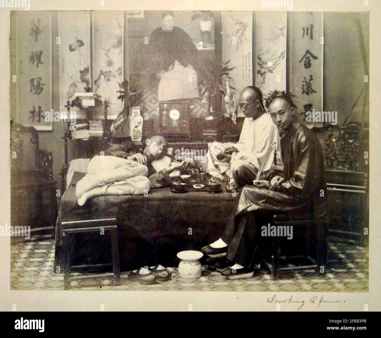 Lai Afong vintage photograph from circa 1880 entitled Smoking Opium. Stock Photo