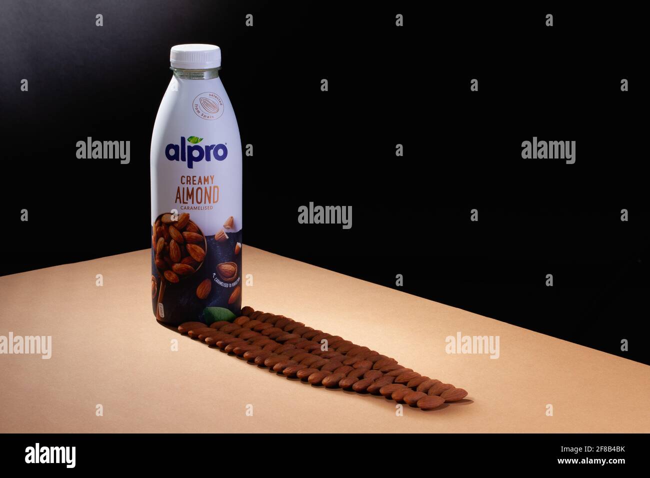 Alpro shadow Prague,Czech almonds almond markets company - is Republic organic of - Alpro drink Photo the 22 brown European Stock table. Alamy that on and a March,2021: