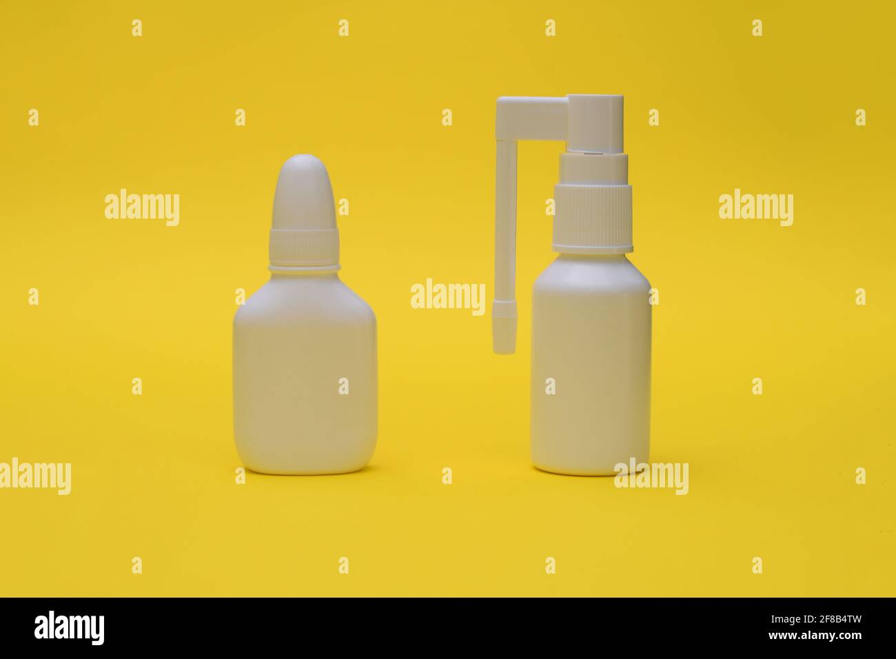 Nasal spray and throat spray close-up. Medicines for flu and colds. Stock Photo