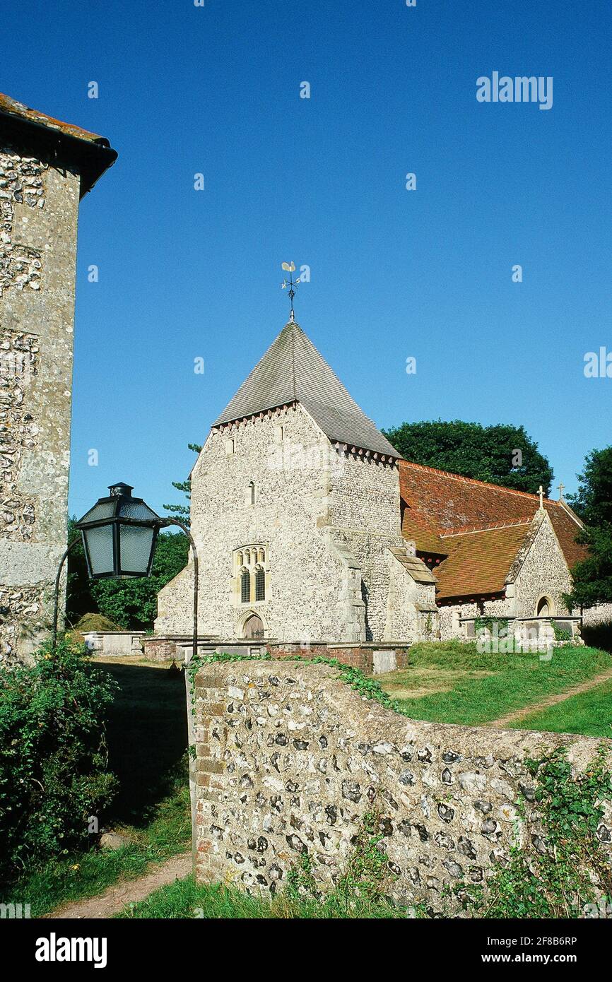 The historic Grade 1 listed Norman church of All Saints, West Dean, near Eastbourne, East Sussex, Southern England Stock Photo