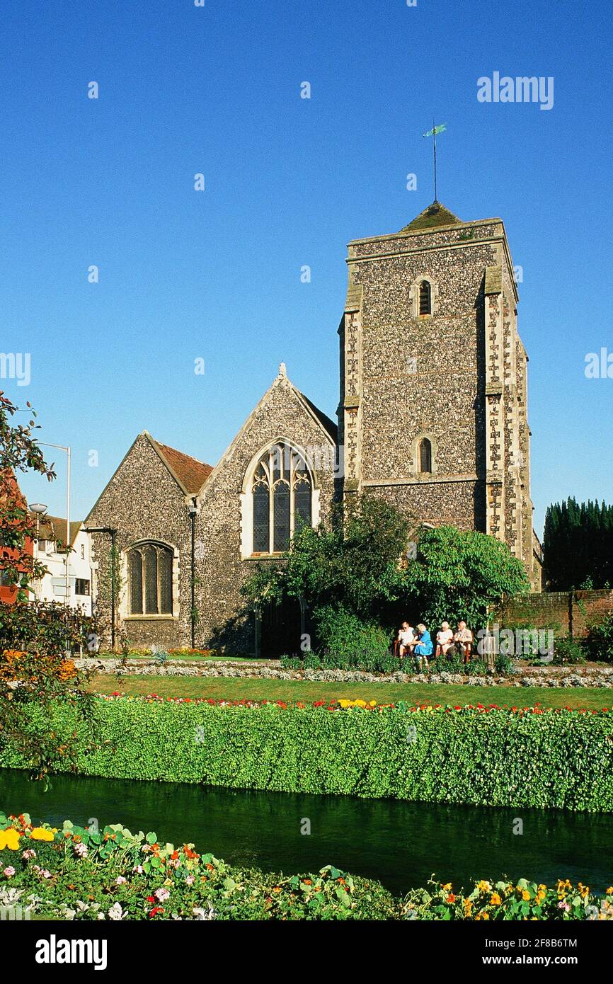 The historic 14th century Holy Cross Church at Westgate, Canterbury, Kent, South East England, with the River Stour in the foreground Stock Photo