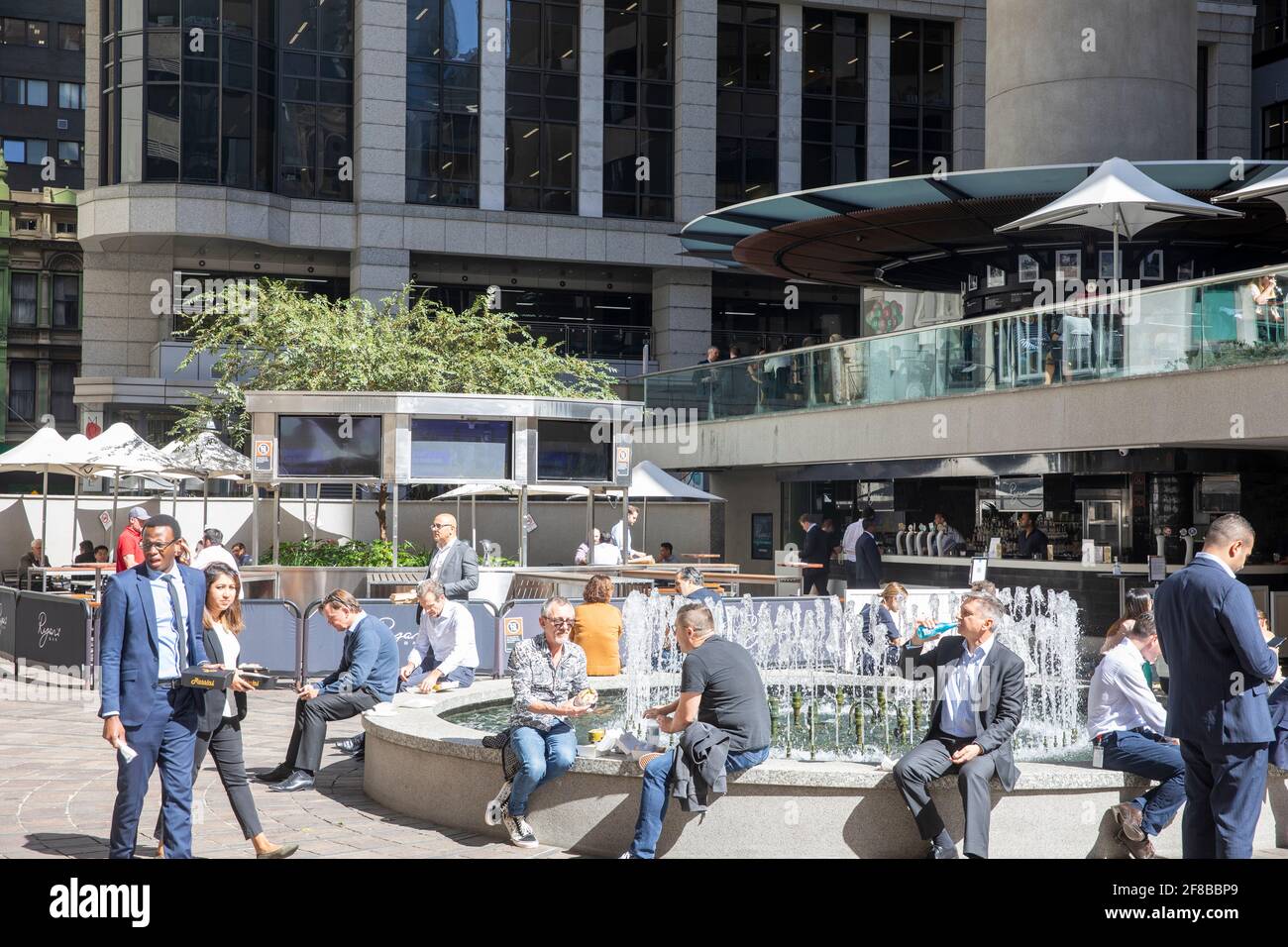 Sydney city centre, office workers enjoying lunch break on a sunny