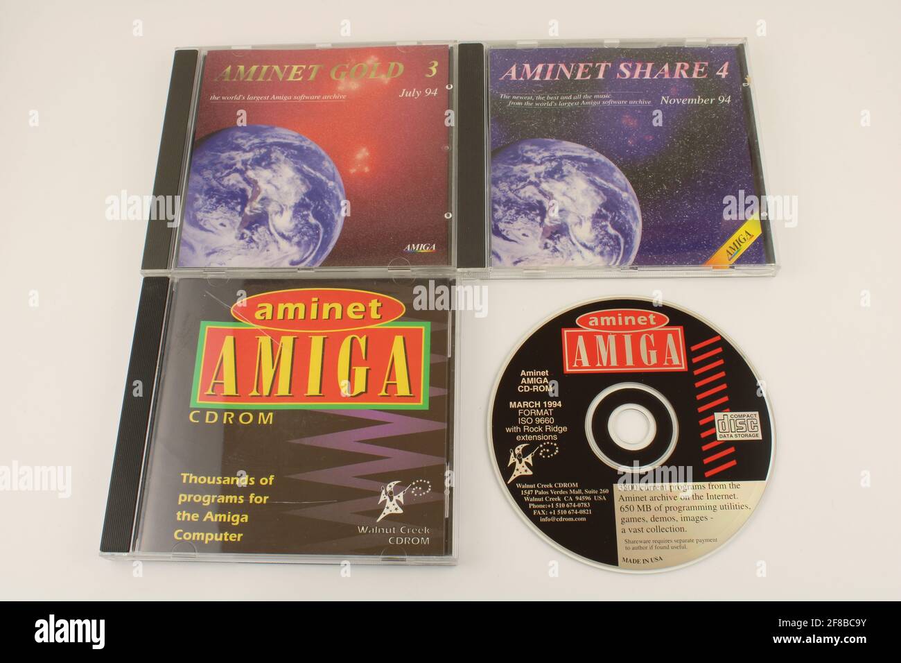 Amiga software CDs in cd cases by Aminet. Old Amiga gaming concept Stock Photo