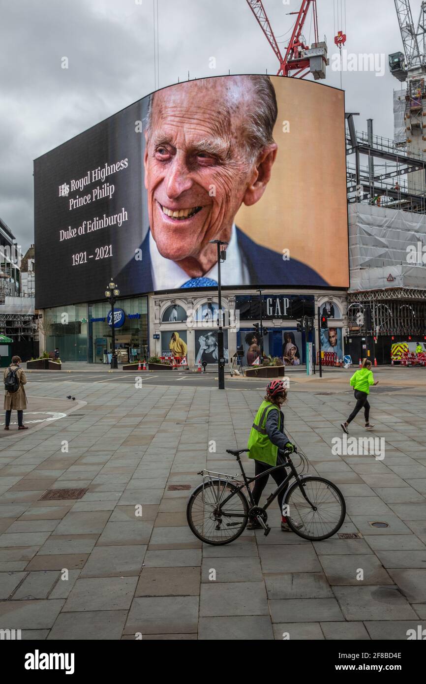 World-famous Piccadilly Circus advertising billboard in central London displayed a tribute to Prince Philip after he died on April 9th 2021 aged 99. Stock Photo