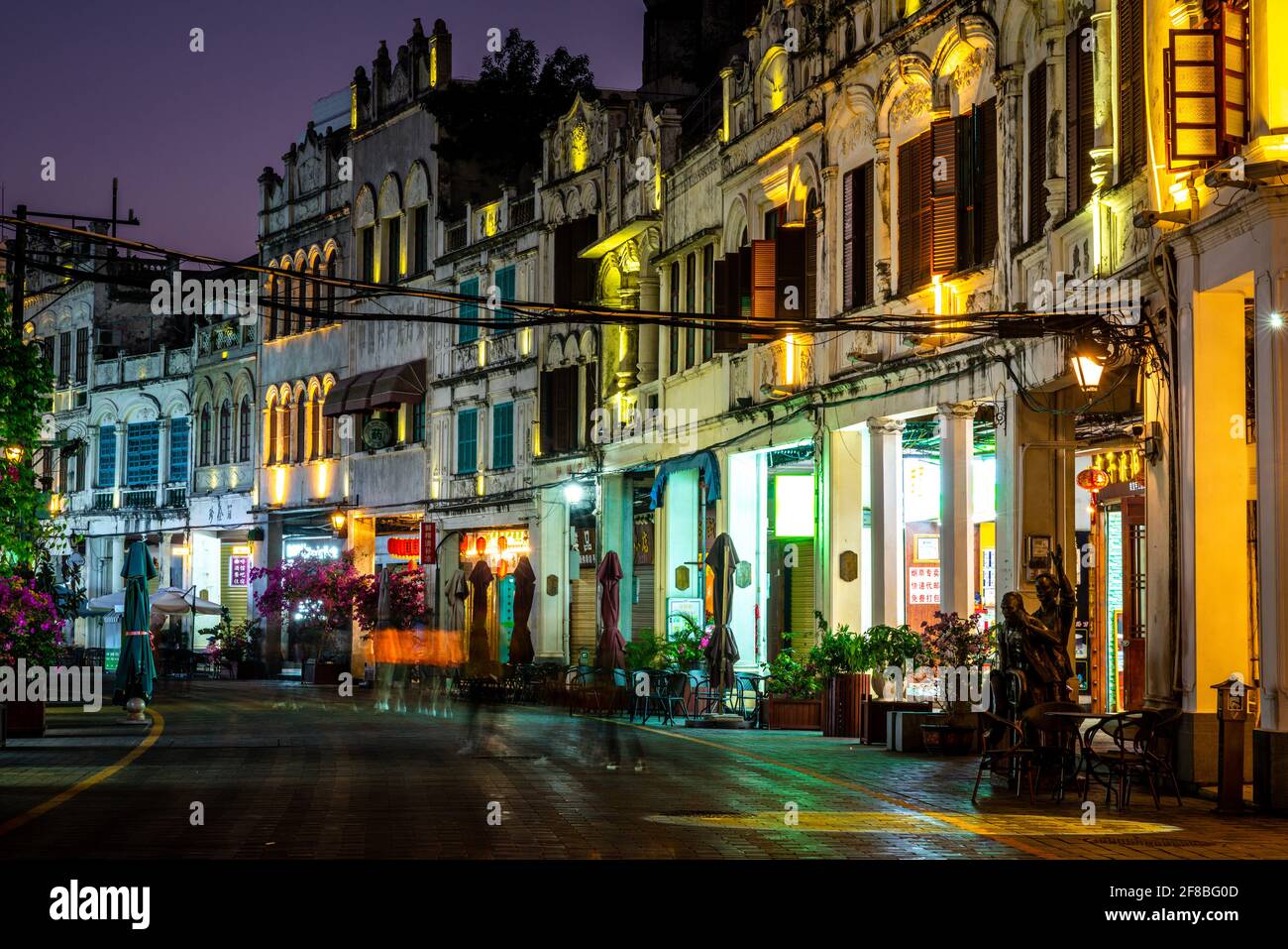 Haikou China , 23 March 2021 : Qilou or Zhongshan old street scenic view illuminated at night with colonial buildings in Haikou old town Hainan China Stock Photo