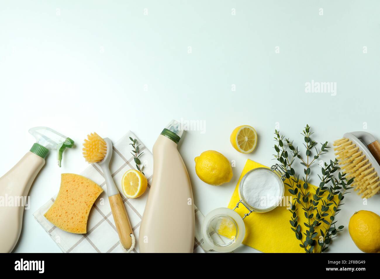 Cleaning concept with eco friendly cleaning tools on white background ...