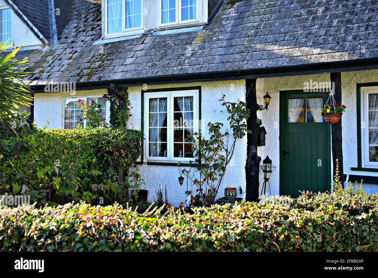 Original 19th century shingles roof cottage in the picturesque village