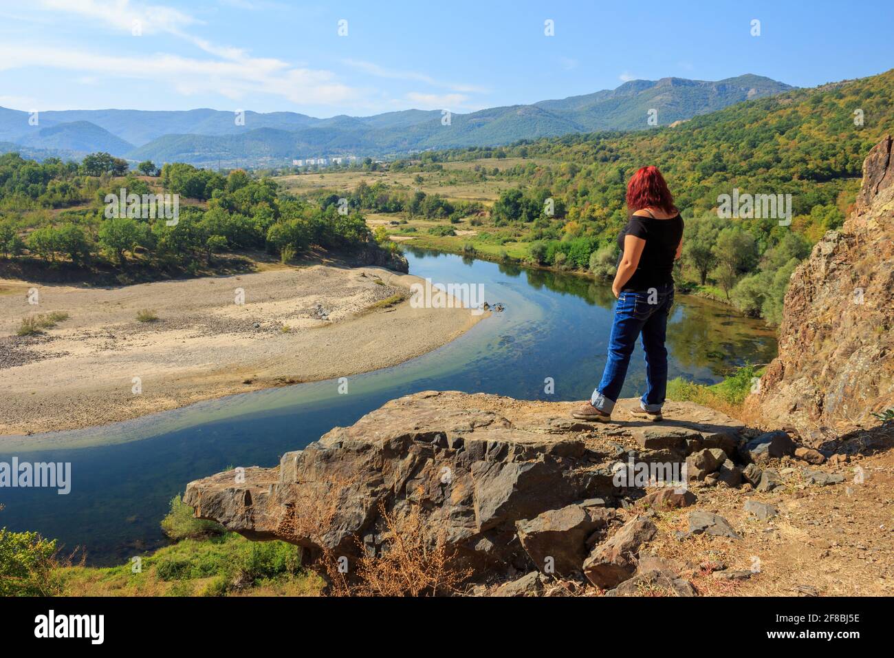 Tourist watching beautiful landscape of crystal river and mountains Stock Photo