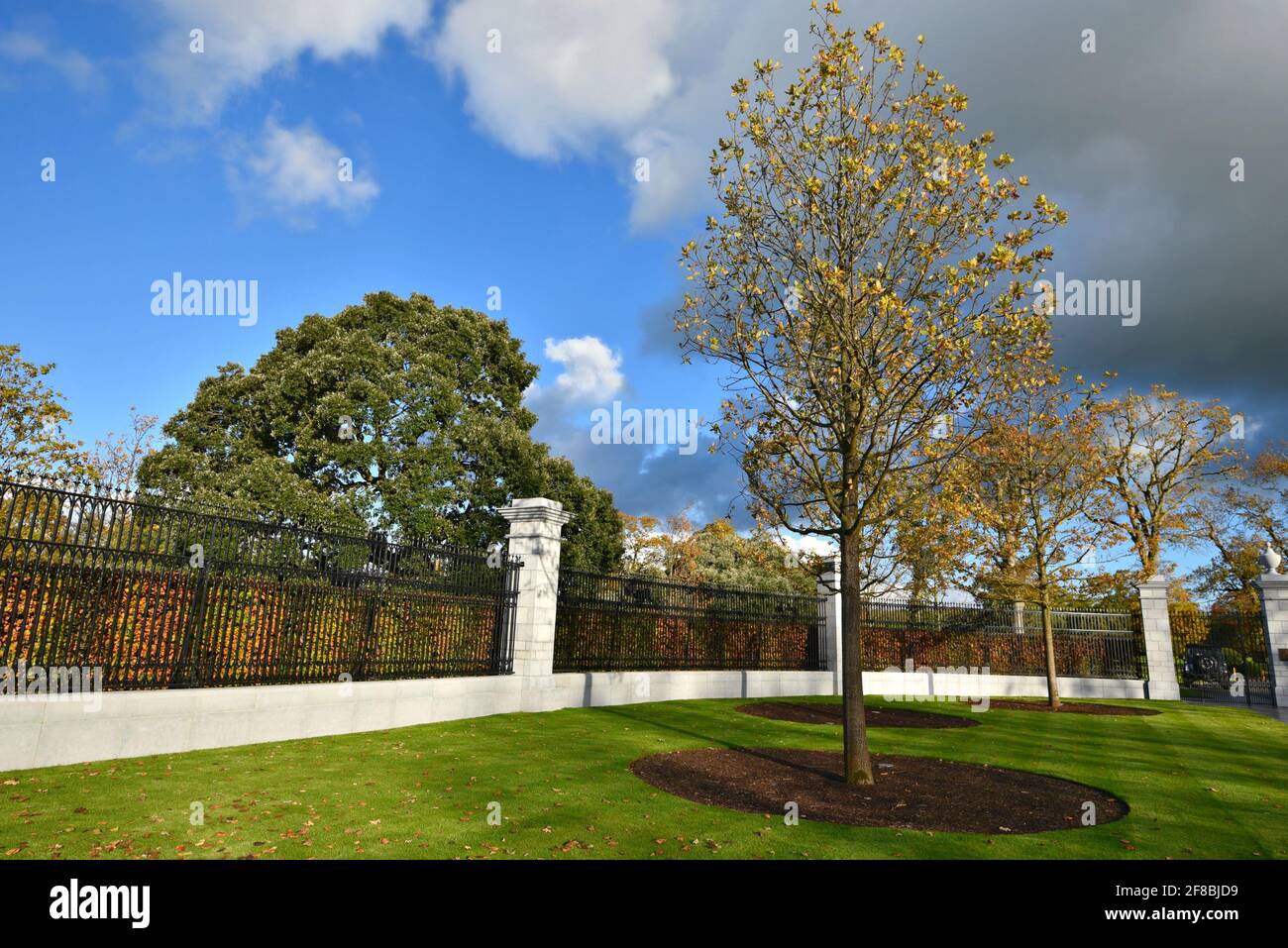 Landscape with scenic main entrance and gardens view of the luxury golf resort Adare Manor on the banks of River Maigue in Adare, Limerick Ireland. Stock Photo
