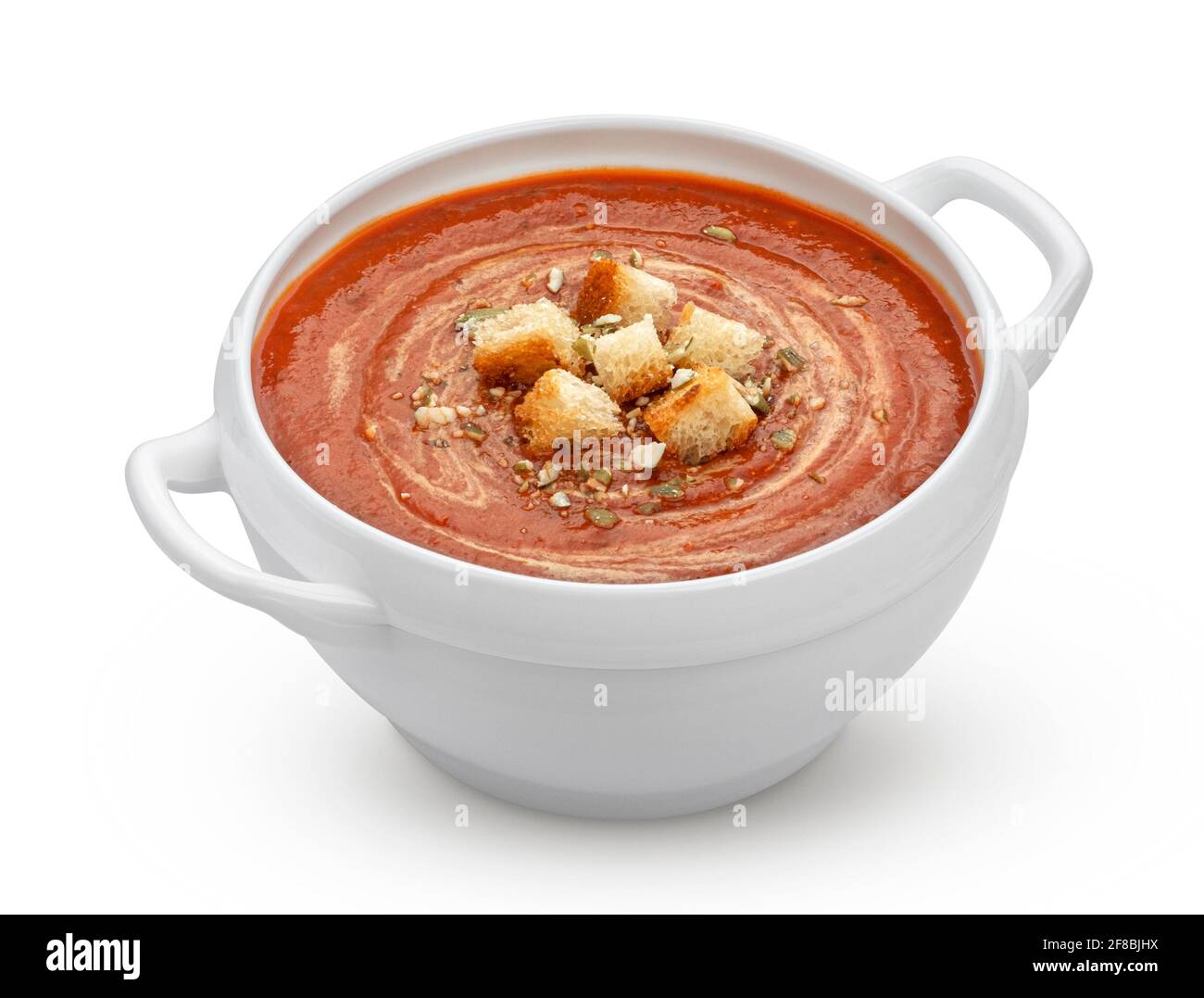 Bowl of tomato soup isolated on white background Stock Photo