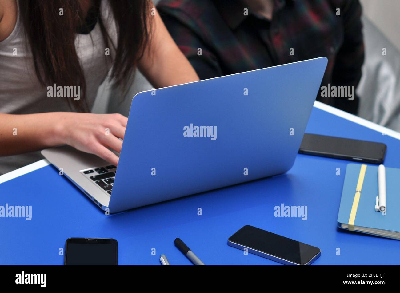 Programmer, Mobile Application Designers, Web Designer working at office. Teamwork and programming websites and mobile applications on the laptop. Stock Photo