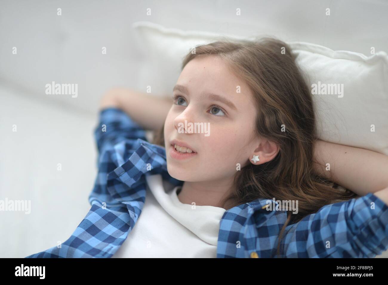 Preteen girl lying bed hi-res stock photography and images - Alamy