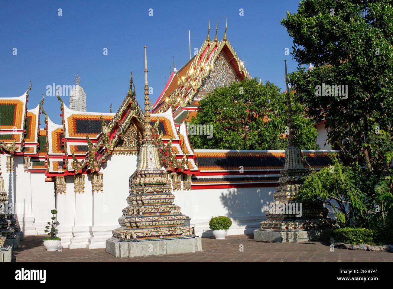 Traditional Thai temple in Bangkok, Thailand with blue sky Stock Photo ...