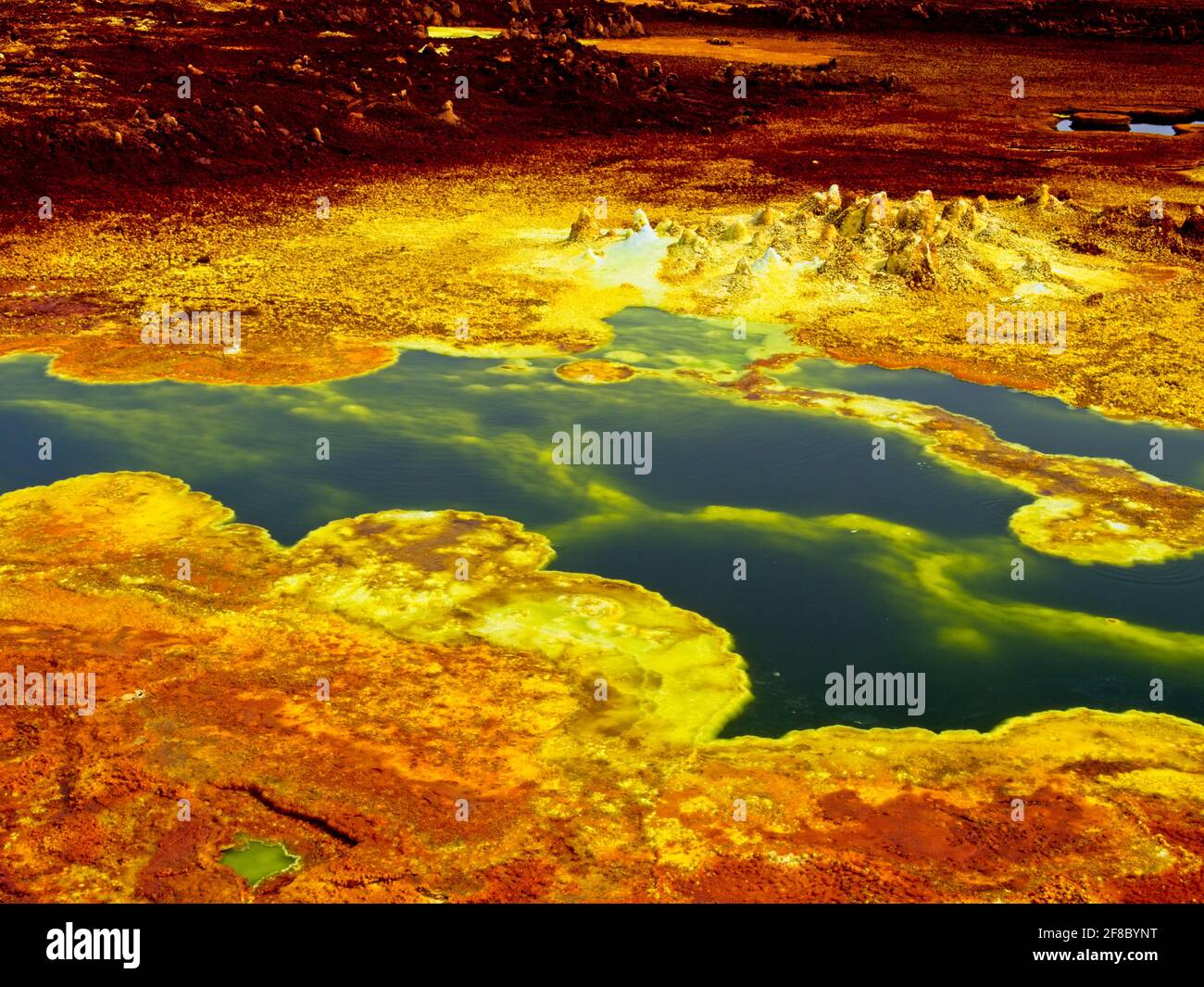 Danakil Depression  landscape of surreal colors and Mars like landscape created by sulphur springs forming bright colors in the hottest place on earth Stock Photo