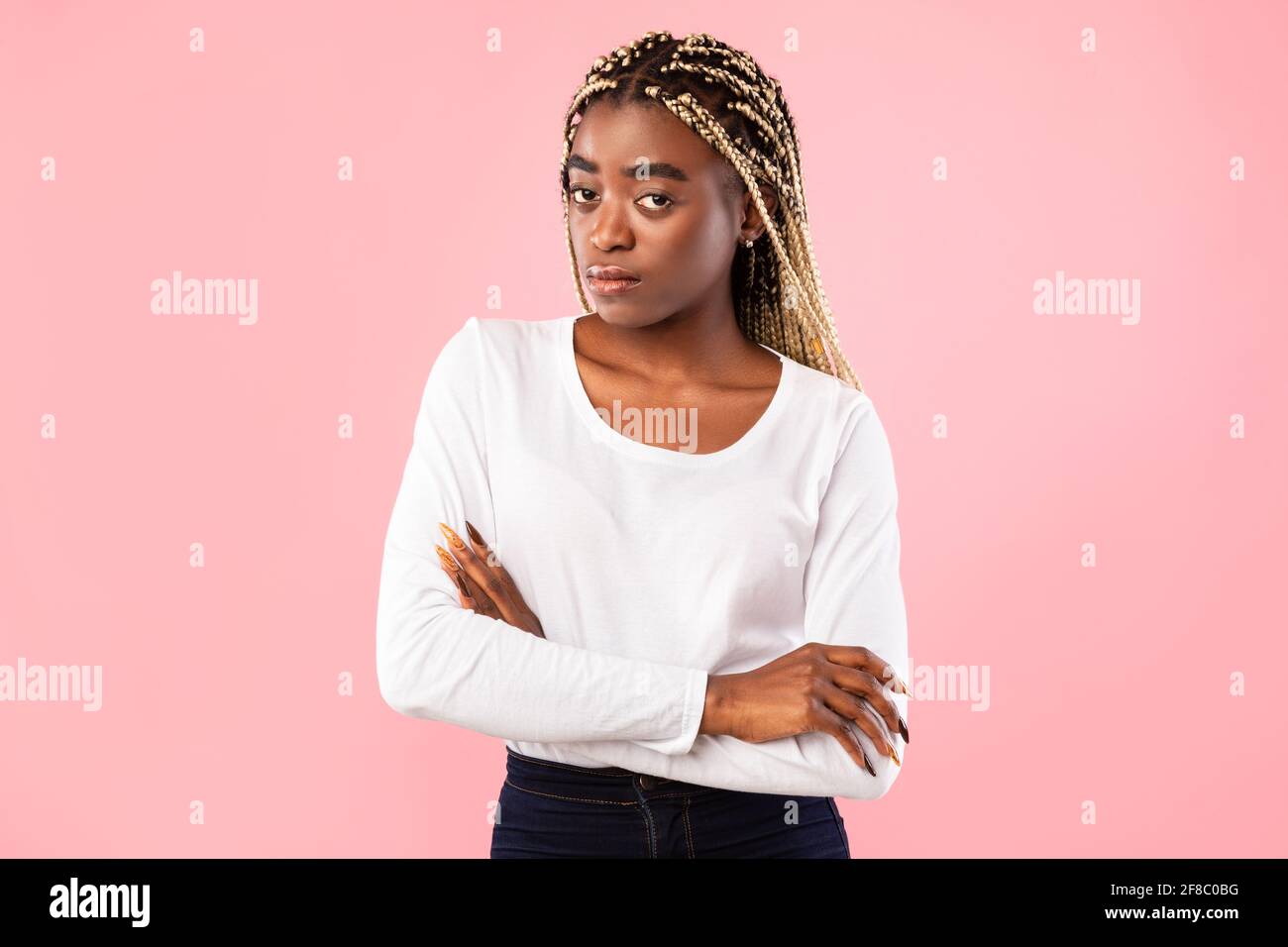 Offended woman crossing arms hi-res stock photography and images - Alamy