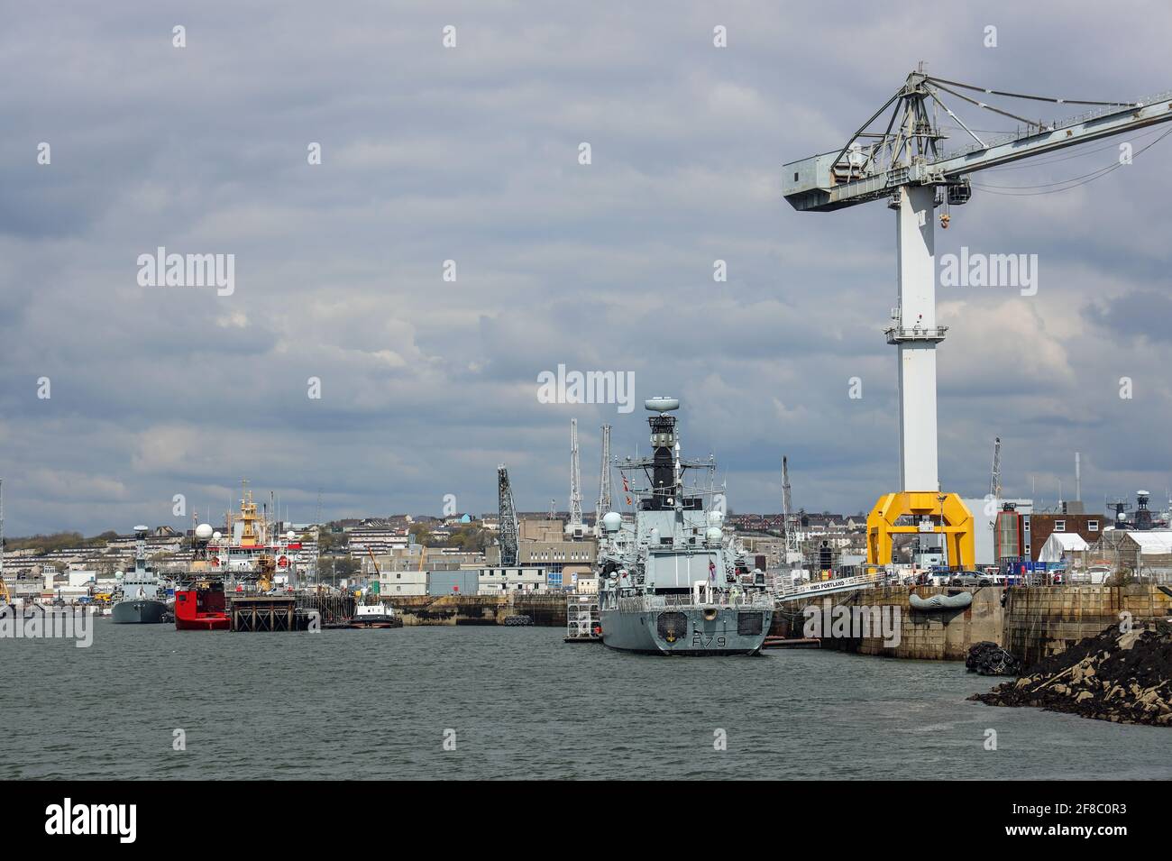 HMS Portland berthed at Devonport. Defence giant Babcock International, operators at Devonport Dockyard, the largest naval base in Western Europe,  ha Stock Photo