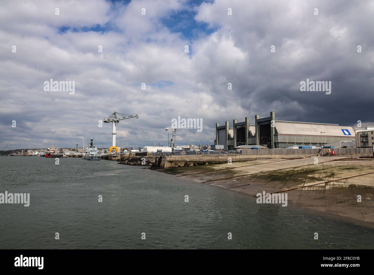 Clouds over Frigate Complex in North Yard. Defence giant Babcock International, operators at Devonport Dockyard, the largest naval base in Western Eur Stock Photo