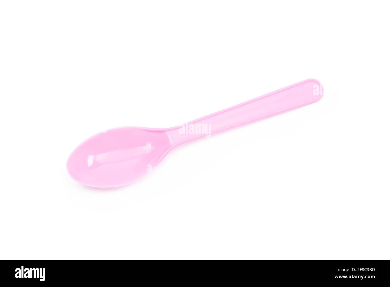 Pink plastic spoon isolated on white background Stock Photo - Alamy