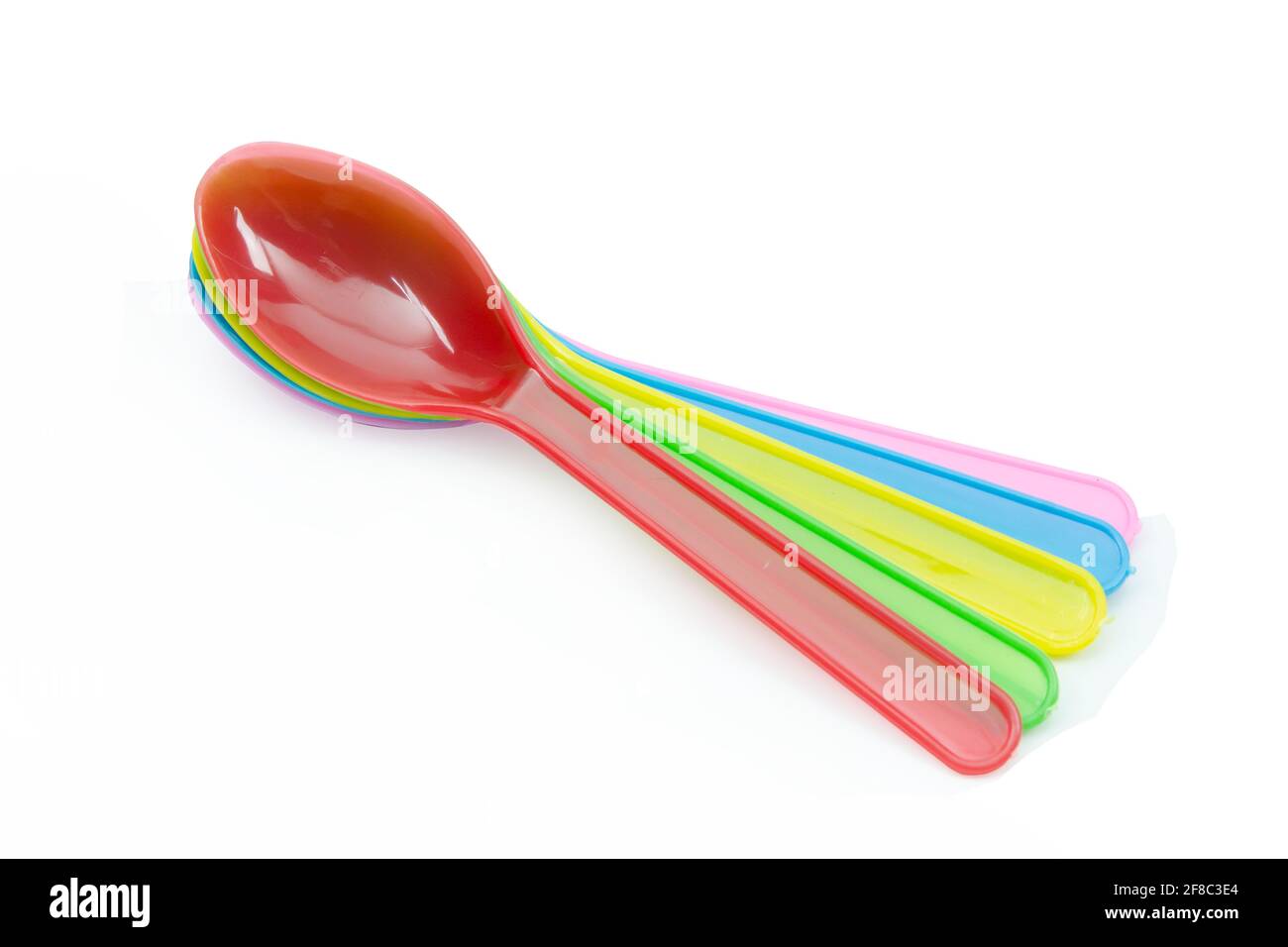 Colorful plastic spoons collection for party isolated on white Stock Photo