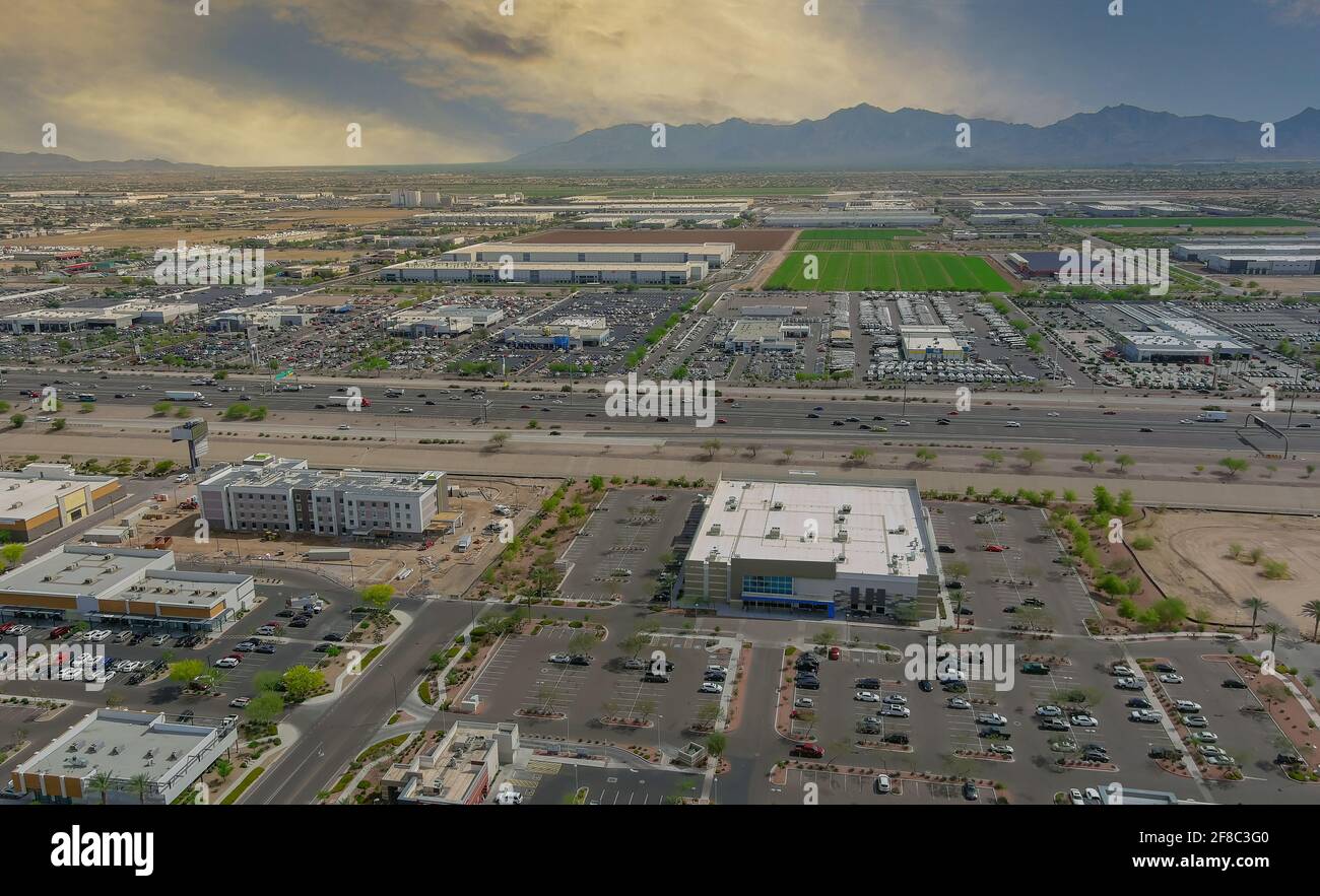 Aerial top view of typical a Avondale small town shopping center with big parking for car on Arizona Stock Photo