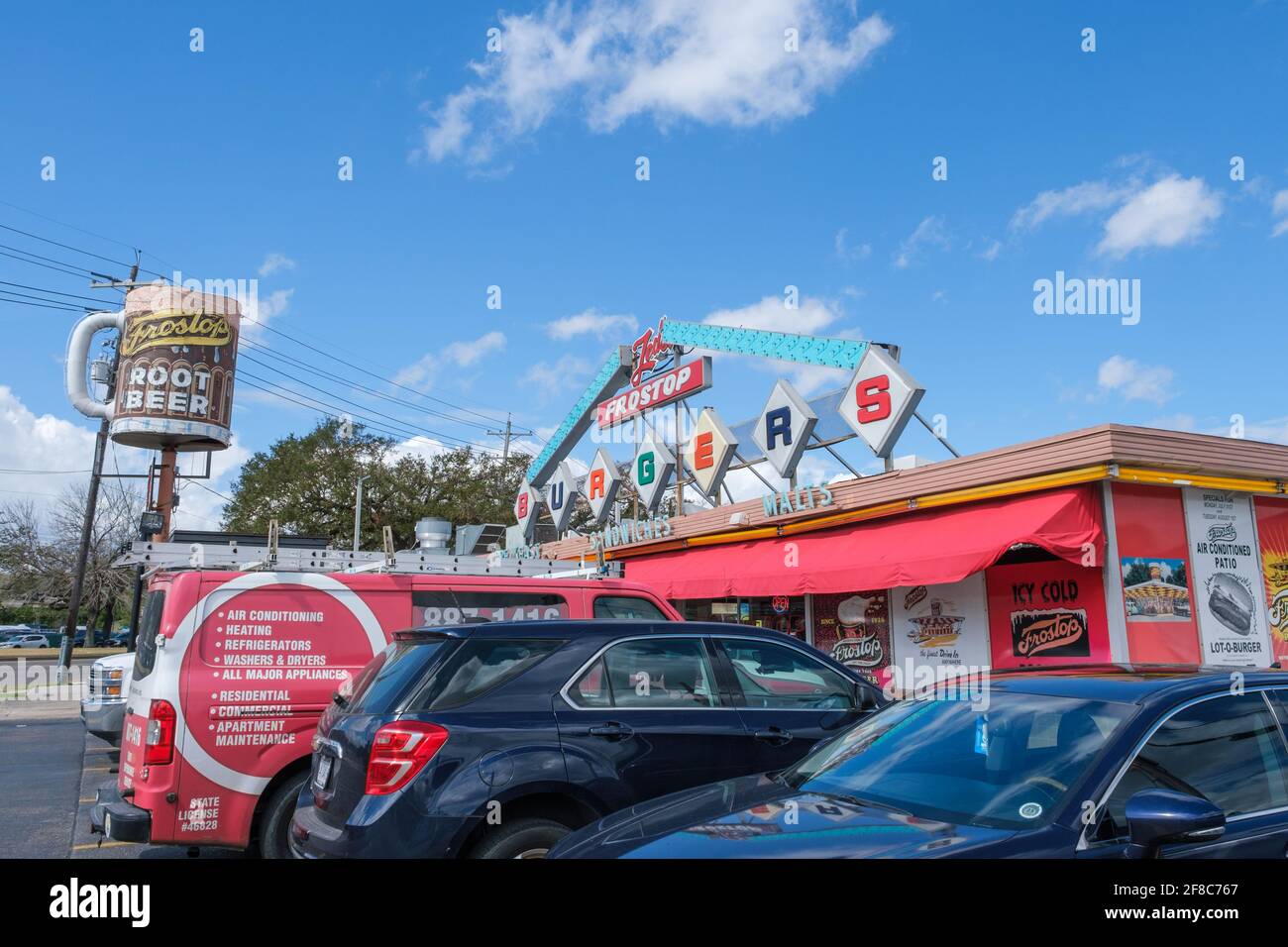 NEW ORLEANS, LA, USA - FEBRUARY 26, 2021: Colorful exterior of Ted's Frostop Restaurant in New Orleans with blue sky background Stock Photo