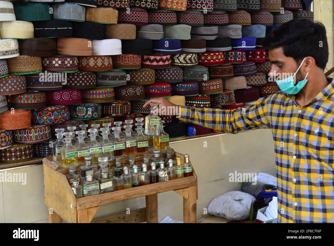 Lahore, Pakistan. 13th Apr, 2021. Pakistani faithful Muslims buying