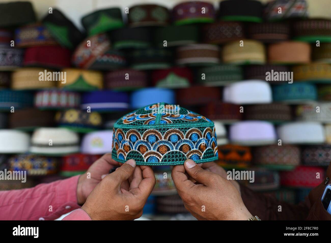 Lahore, Pakistan. 13th Apr, 2021. Pakistani faithful Muslims buying