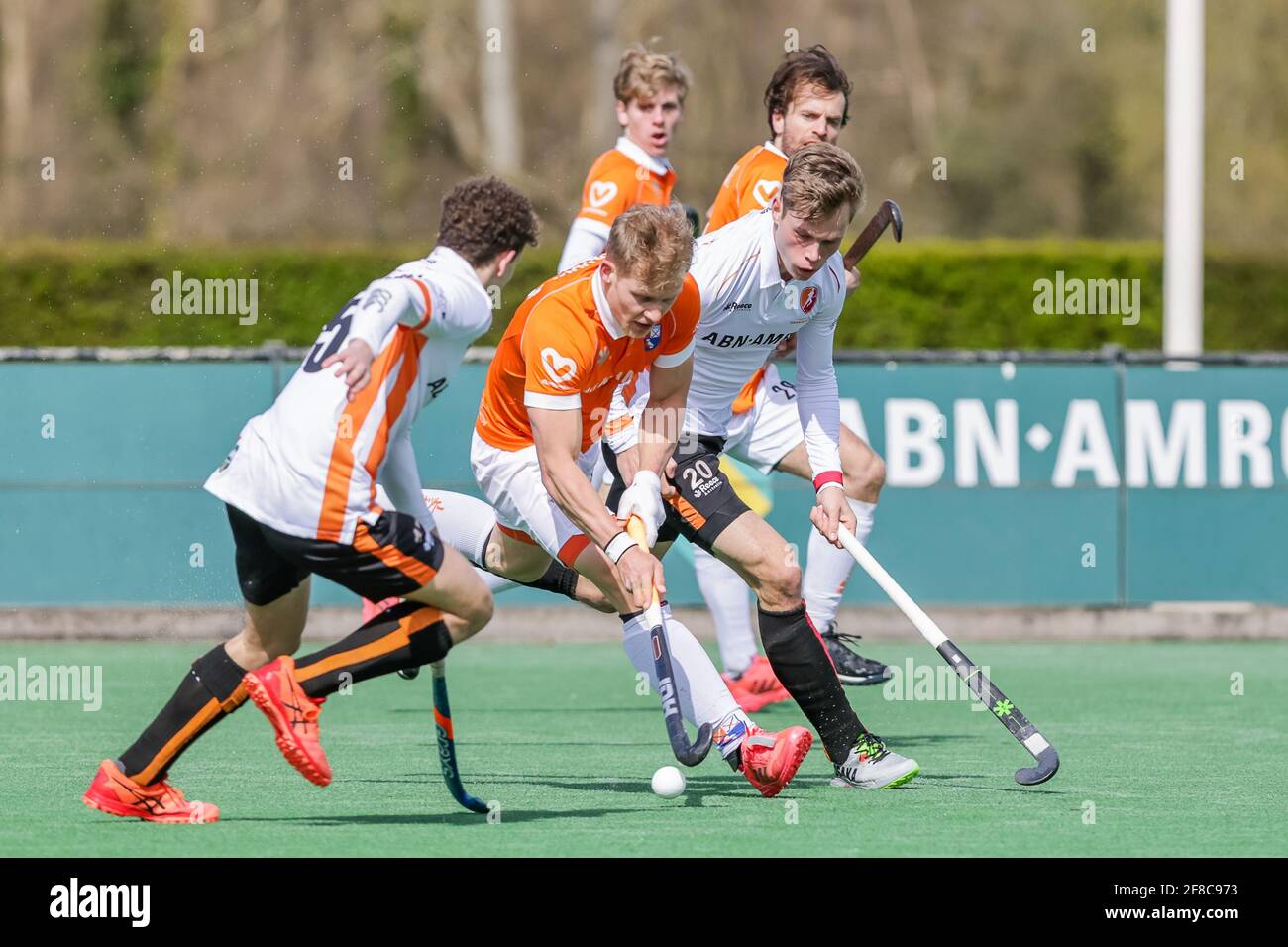 BLOEMENDAAL, NETHERLANDS - APRIL 11: Job Scheffers of Oranje Rood, Jasper Brinkman of Bloemendaal during the Dutch Men Hockey Hoofdklasse match betwee Stock Photo